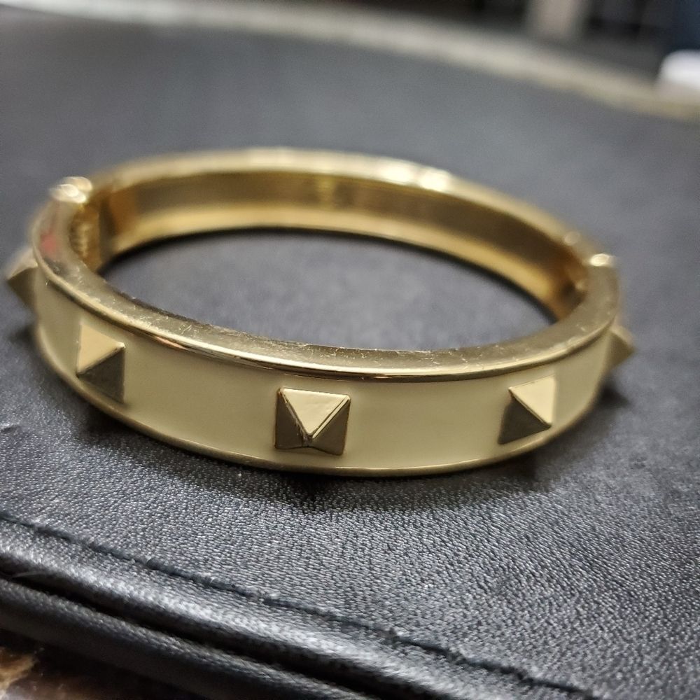 Gold tone and cream enamel spike hinge bangle 7.5"